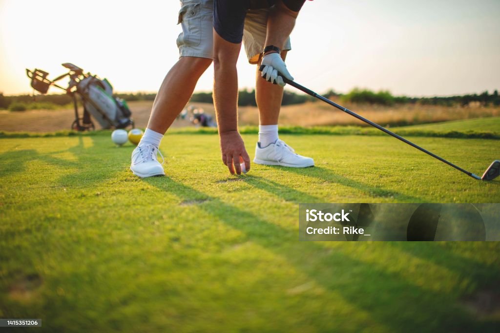 Man playing golf in summer Man playing golf in summer. Active Lifestyle Stock Photo