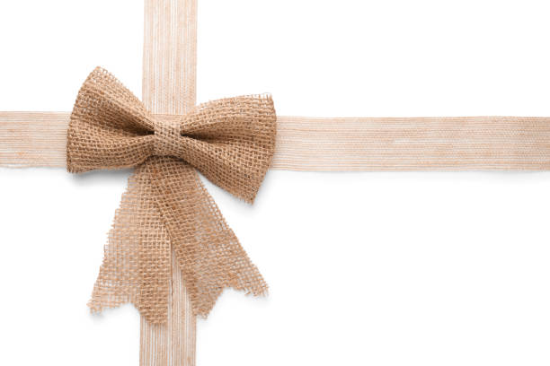 Gold colored silk ribbons isolated on white background ( with clipping path)