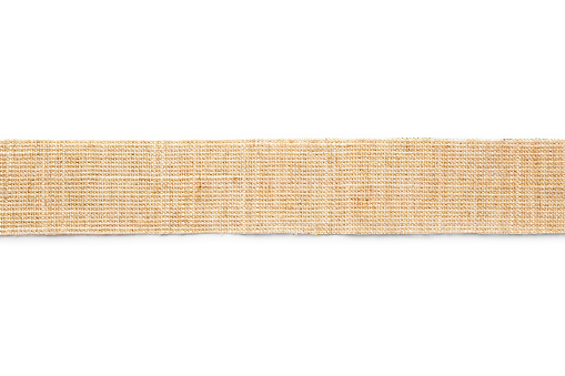 Wide burlap ribbon on white background, top view