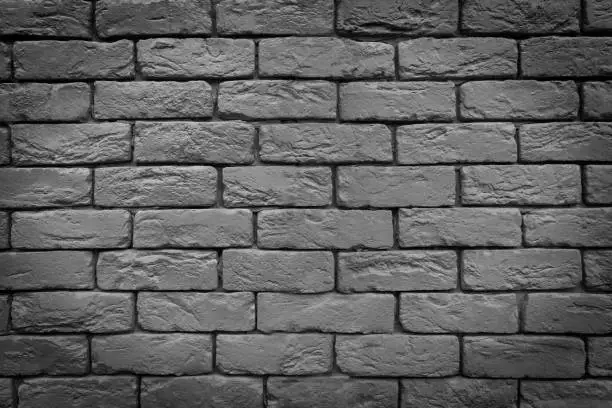 Painted brick wall. Black and white image for background