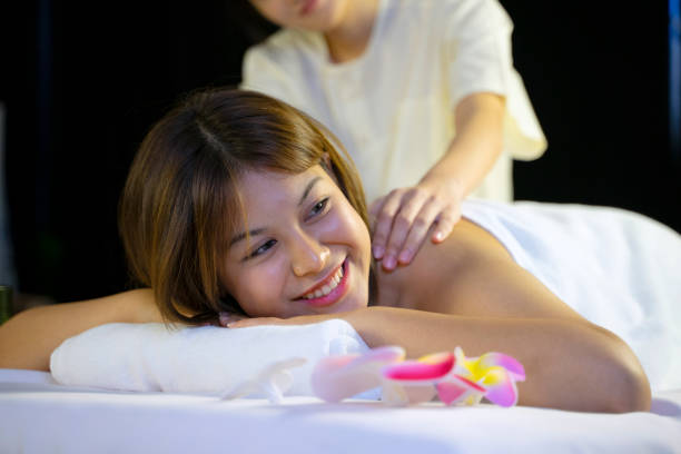 Shot of a young woman enjoying a back massagehttp://195.154.178.81/DATA/i_collage/pi/shoots/805880.jpg
