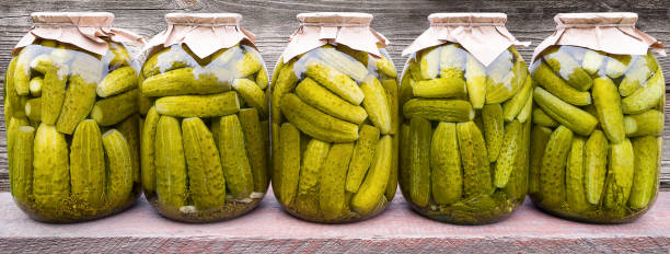 istock Five cans of pickled cucumbers 1415356516