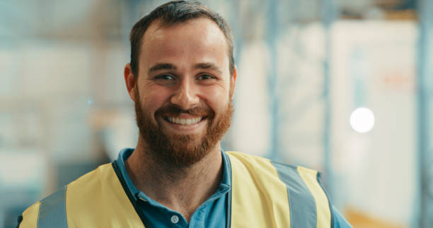 Engineer, technician and building contractor looking happy and satisfied with his job and career choice. Portrait of foreman, site manager and supervisor smiling and ready for building contract