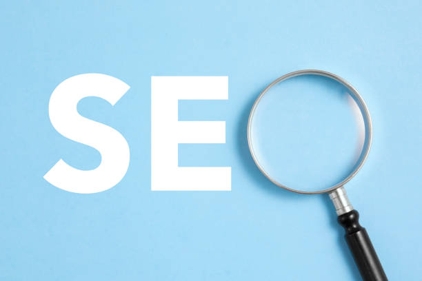 istock SEO Word Created with Magnifying  Glass 1415359476