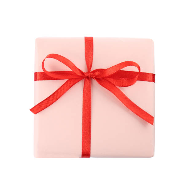 istock Beautiful gift box with red bow isolated on white, top view 1415359555