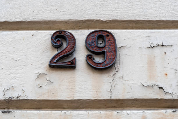 istock Number twenty nine on peeling wall by doorway 1415362863