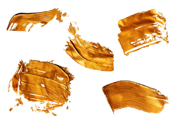 istock Textured golden strokes isolated on white background. 1415363852