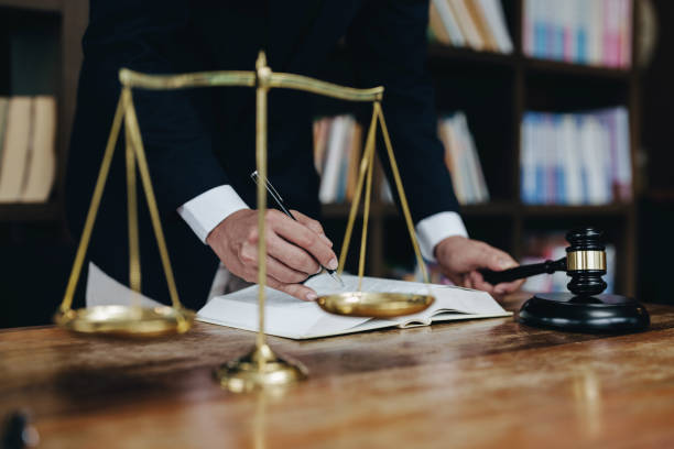 istock Discussing legal matters and signing important documents 1415370701