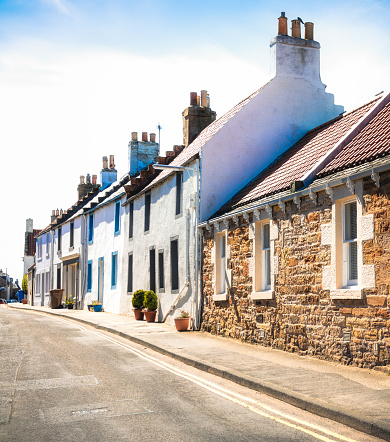 A row of houses on a street in the Scottish seaside town of Elie, Fife.