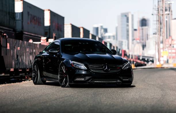 Seattle, WA, USA8/11/2022Black Mercedes Benz C63 S driving on the road