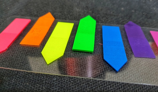 Small colorful sticky notes for adding document notes.