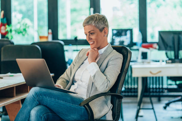 istock Businesswoman with laptop 1415376641