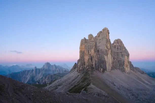 Photo of Stunning view of the Three Peaks of Lavaredo, (Tre cime di Lavaredo) during a beautiful sunrise. The Three Peaks of Lavaredo are the undisputed symbol of the Dolomites, Italy.