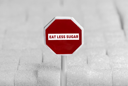Sugar cubes with stop sign.