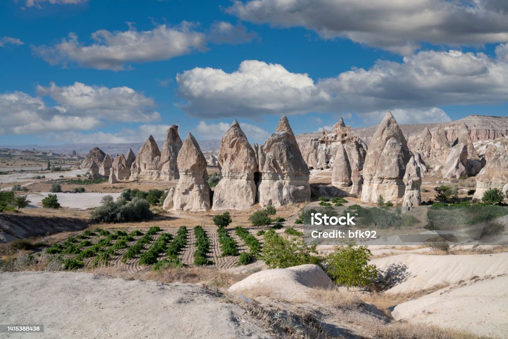 Rock formations and cave churches in Sword Valley (Kiliclar Vadisi), Cappadocia. Famous landmark in Turkey. Hiking place of Sword Valley (Kiliclar Vadisi).  Fairy Chimneys in Cappadocia Asia Stock Photo