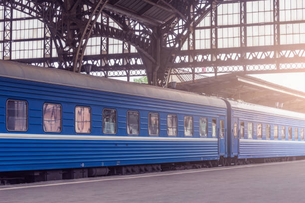 istock Train stands by the platform before departure. 1415391637