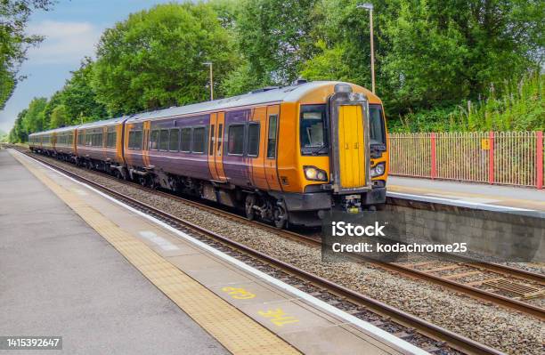 Generic Diesel Powered Railway Line Station In The English Countryside Stock Photo - Download Image Now