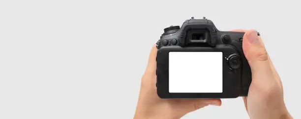 Back of DSLR digital camera. Camera with blank screen isolated on white background