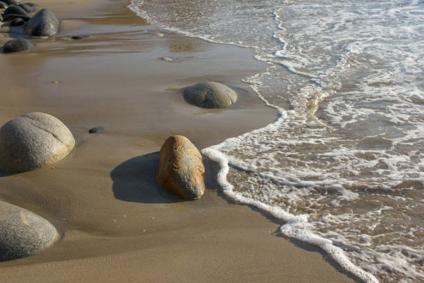 istock another wave kissing the coast 1415396590