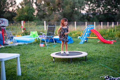 Little Girl at backyard playground