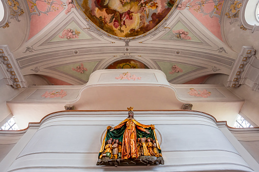 Wildsteig, bavaria, germany, june 02, 2022 : baroque and rococo frescoes and architectural decors of rear chapel in the nave Wildsteig village church