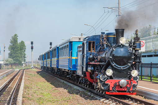 Steam train of Children's railway stands by the platform. Saint Petersburg. Russia.