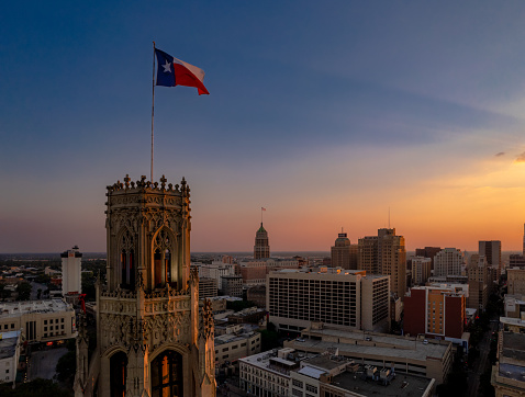 The crown of an old hotel in front of Downtown San Antonio