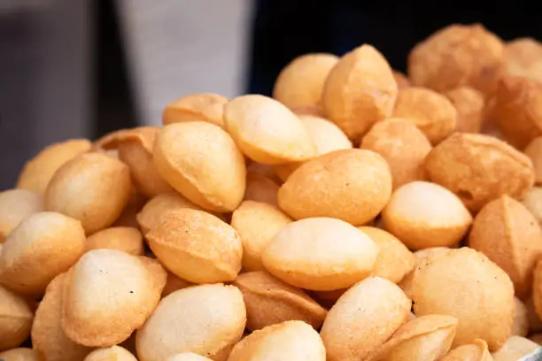 Photo of Group Of Traditional Pani Puri Also Known As Paani Poori, Golgappe, Batashe, Gupchup Is Popular Indian Street Chaat Snacks Used In Sev Pudi, Bhel Poodi, Panipuri, Masala Golpgappa, Bhel Puri Chaat