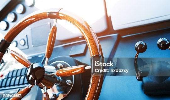 istock Steering wheel on luxury yacht 1415405857