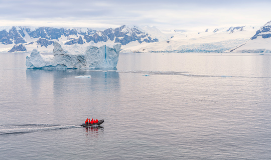 Expeditions - Zodiac cruises through Antarctic iceberg landscape at Portal Point which is located at the entrance to Charlotte Bay on the Reclus Peninsula, on the west coast of Graham Land.