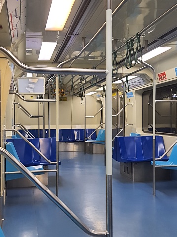 A modern subway train at a station