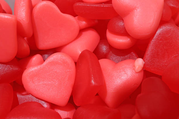 istock Colored jelly beans shaped like a heart 1415406923