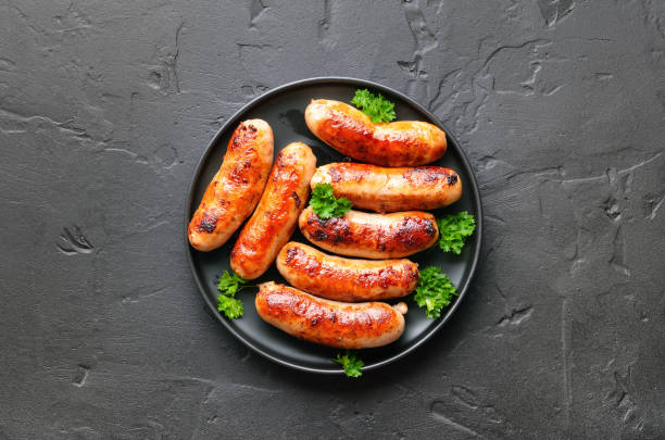 Barbecue bratwurst on plate stock photo