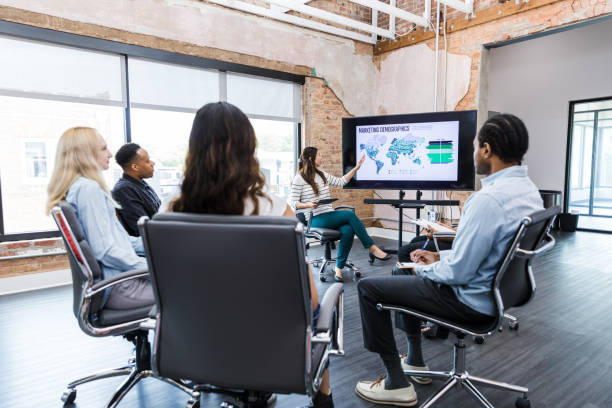 istock Diverse businesspeople attend global marketing presentation 1415407824
