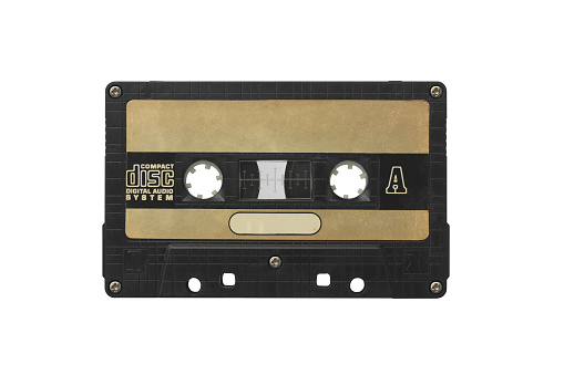 Close up of a vintage music audio tape on white background