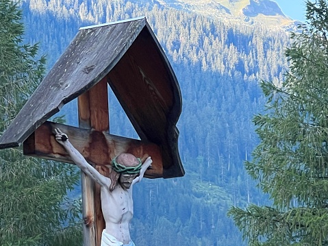 Crucifix in the mountains, seen in Graubunden