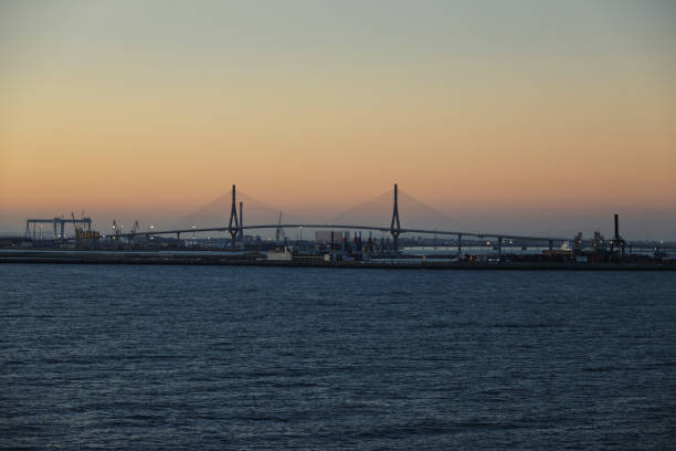 La Papa bridge which links Cadiz with Puerto Real in mainland Spain at sunrise stock photo