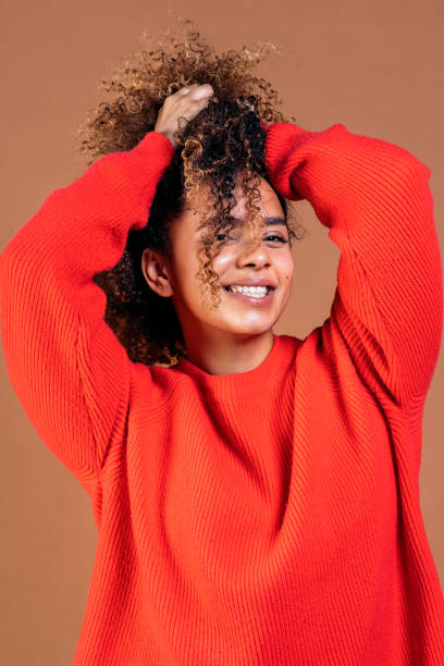 istock Cheerful Afro Woman in Studio 1415415530