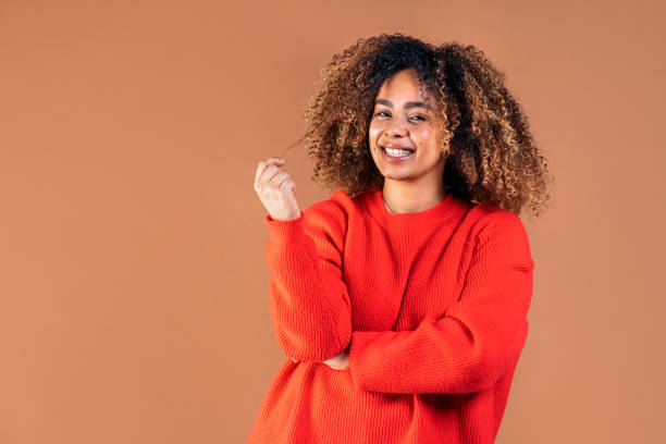 istock Cheerful Afro Woman in Studio 1415415551