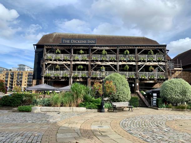 London, UK. The beautiful exterior of The Dickens Inn public house, located on St. Katherine Docks in London, UK. Summer in London