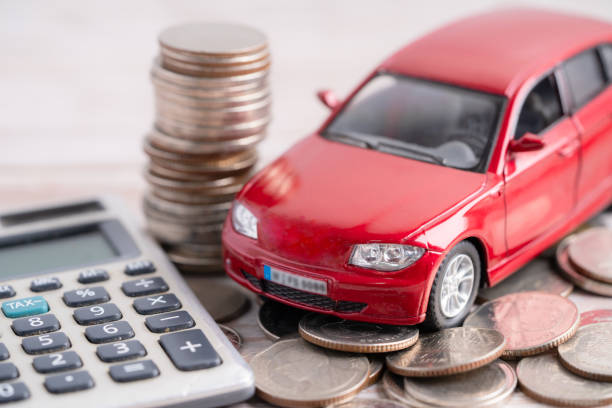 Bangkok, Thailand, June 1, 2022 Car on stack of coins. Car loan, Finance, saving money, insurance and leasing time concepts. Bangkok, Thailand, June 1, 2022 Car on stack of coins. Car loan, Finance, saving money, insurance and leasing time concepts. cash for cars stock pictures, royalty-free photos & images