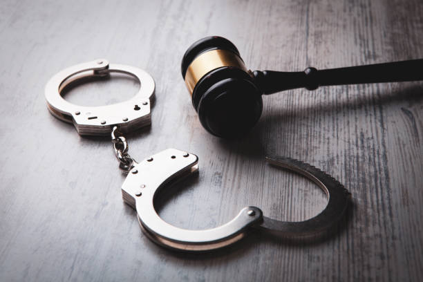Legal law concept image - gavel and handcuffs Legal law concept image - gavel and handcuffs judgement free stock pictures, royalty-free photos & images