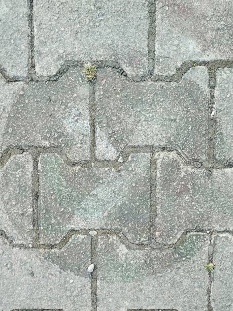 Trace of a letter on a concrete floor