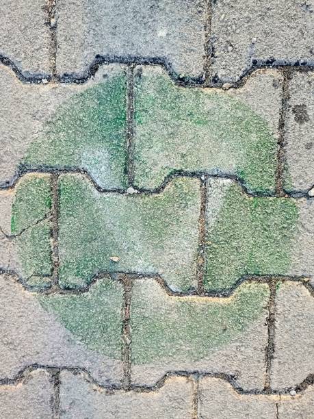 Trace of a letter on a concrete floor