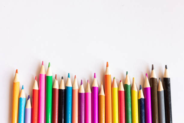 istock Colorful Wooden Crayons on white background 1415422614