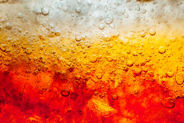 istock macro cola drink background,Cola with Ice. Food background ,Cola close-up ,design element. Beer bubbles macro,Ice, Bubble, Backgrounds, Ice Cube, Abstract Background 1415422619