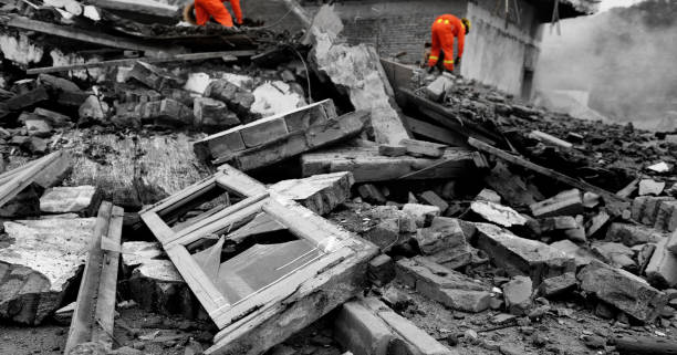 istock Search and rescue forces searching through a destroyed building 1415423115