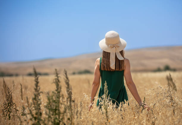 Green dresses Blonde girl in oat fieldLocation : Ankara - Turkey