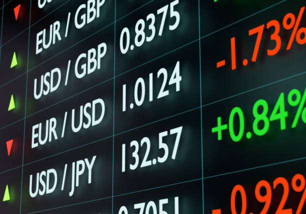 istock Currency board with different exchange rates. Euro falls against the US dollar. 1415424578