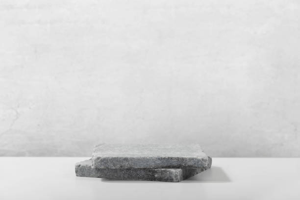 istock Stone podium for packaging and cosmetic presentation. Monochrome gray template for mockup, banner 1415427308